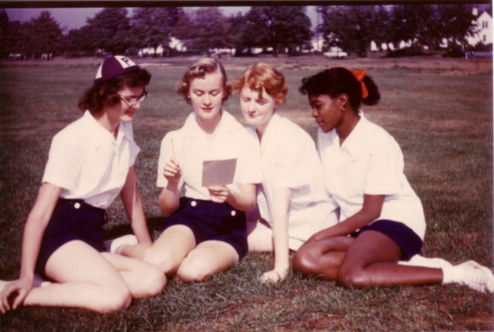 Freshmen students sitting on the grass in 1953. Photo Courtesy of the University Archives.&nbsp;
