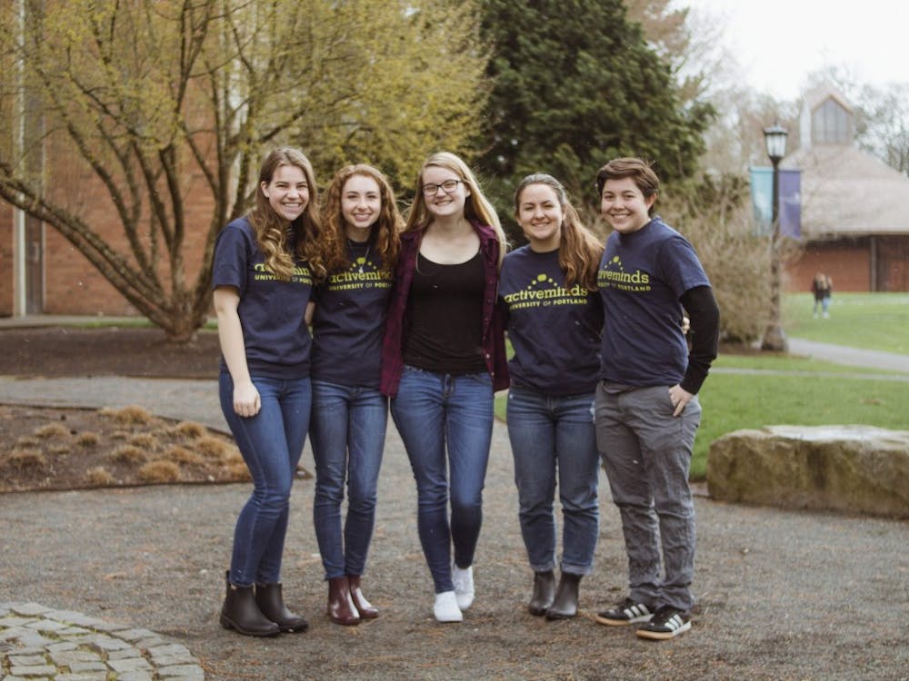 Community Engagement Editor Natalie Nygren poses with four of the five Active Minds officers. From Left to Right: Ryan Martin, Rachel Mehlman, Natalie Nygren, Peyton Hockett, Amy Moore.