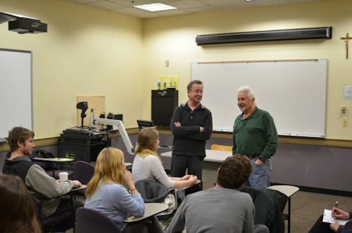  Steve Kolmes and Russell Butkus joint-teach ENV 400, integrating seminar in environmental science. Students enjoy their bantering humor in the classroom. Photo by Parker Shoaff