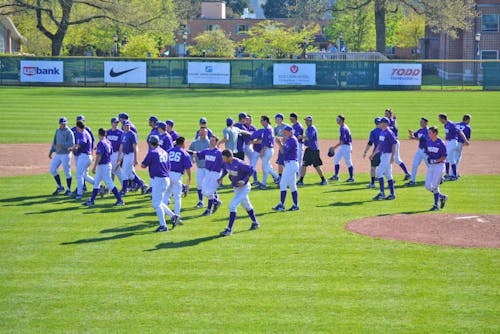  The team celebrates after a walk off single from shortstop Michael Lucarelli. The Pilots came back multiple times to beat USD 10-9 on Saturday.