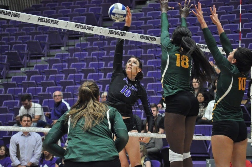  Photo by Kristen Garcia| Emily Liger swings at a ball in the Portland vs. USF match. Liger had 21 kills on the match.