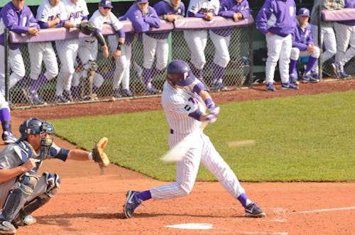  Junior Michael Lucarelli swings at a pitch in a game against UC Irvine earlier this season. Photo by Parker Shoaff