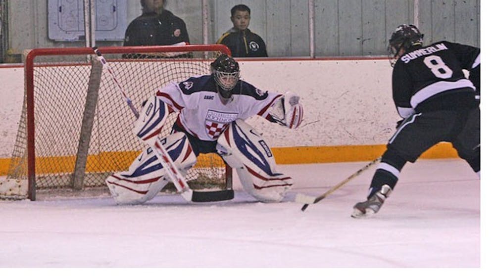 Cameron Purves, No. 33, goalie, during the club hockey team's win over Loyola