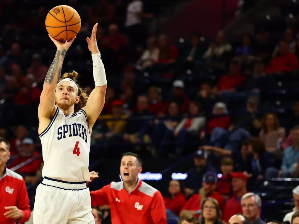 Graduate Guard Will Johnston plays against Gardner-Webb. Courtesy of Richmond Athletics