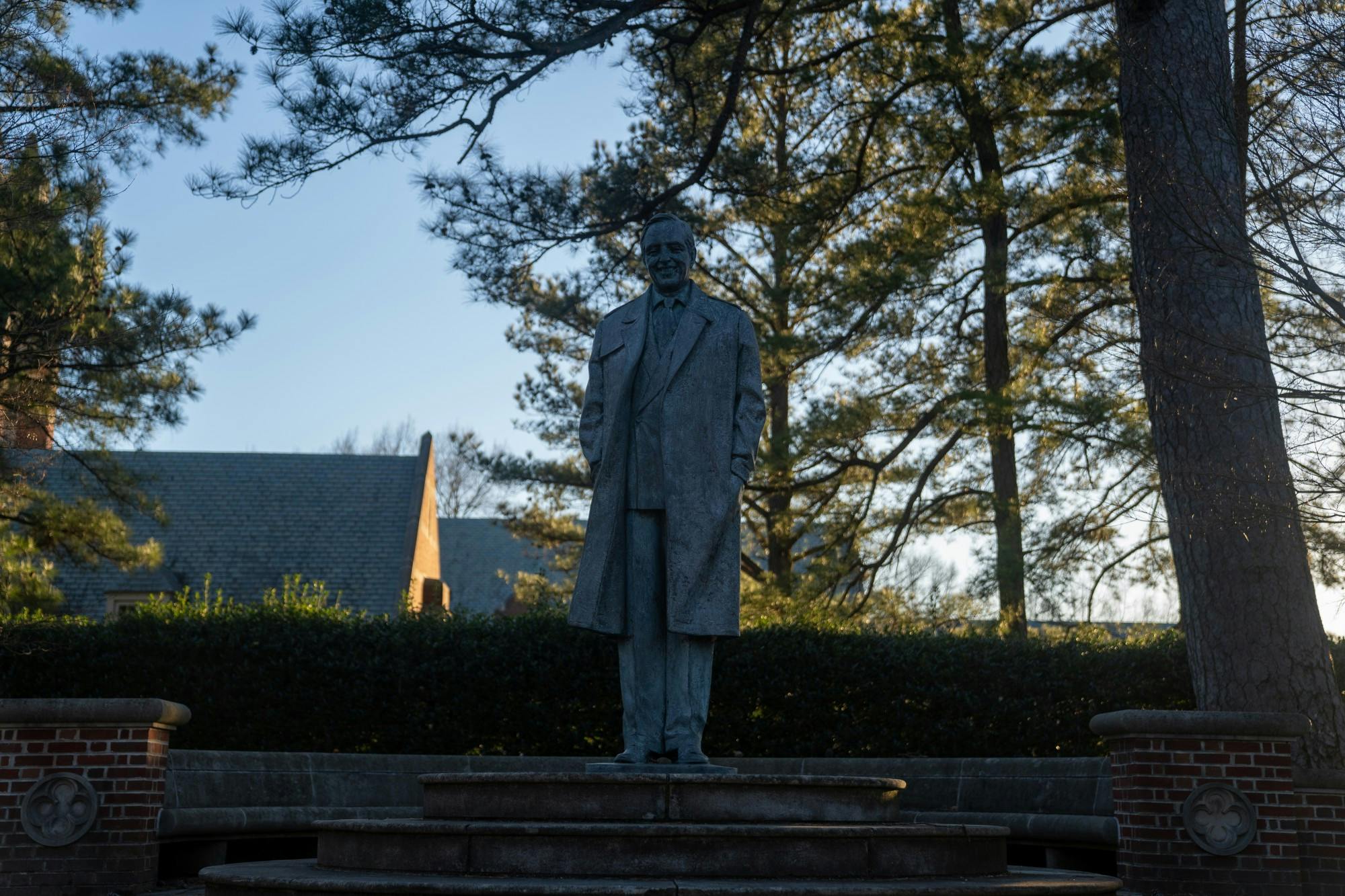 The statue of University benefactor E. Claiborne Robins stands in the academic quad.
