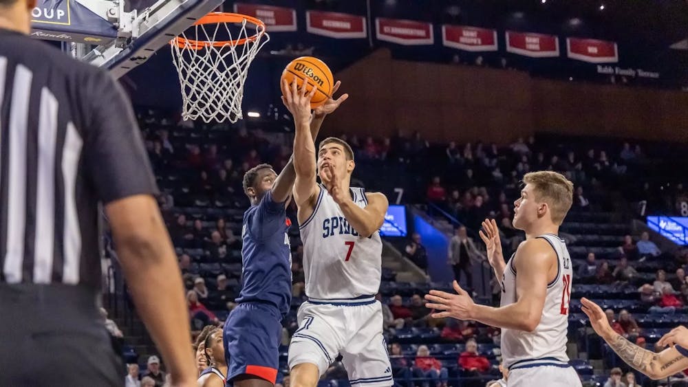 Graduate forward Dusan Neskovic goes for a basket. Courtesy of Richmond Athletics.