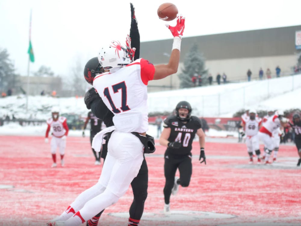 Richmond receiver Jarmal Bevels attempts to catch a pass despite tight coverage during Saturday's FCS quarterfinal game against Eastern Washington.