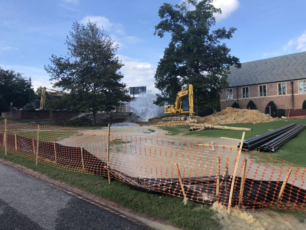 <p>Water spouting from a pipe outside of Sarah Brunet Hall on Monday afternoon.&nbsp;</p>