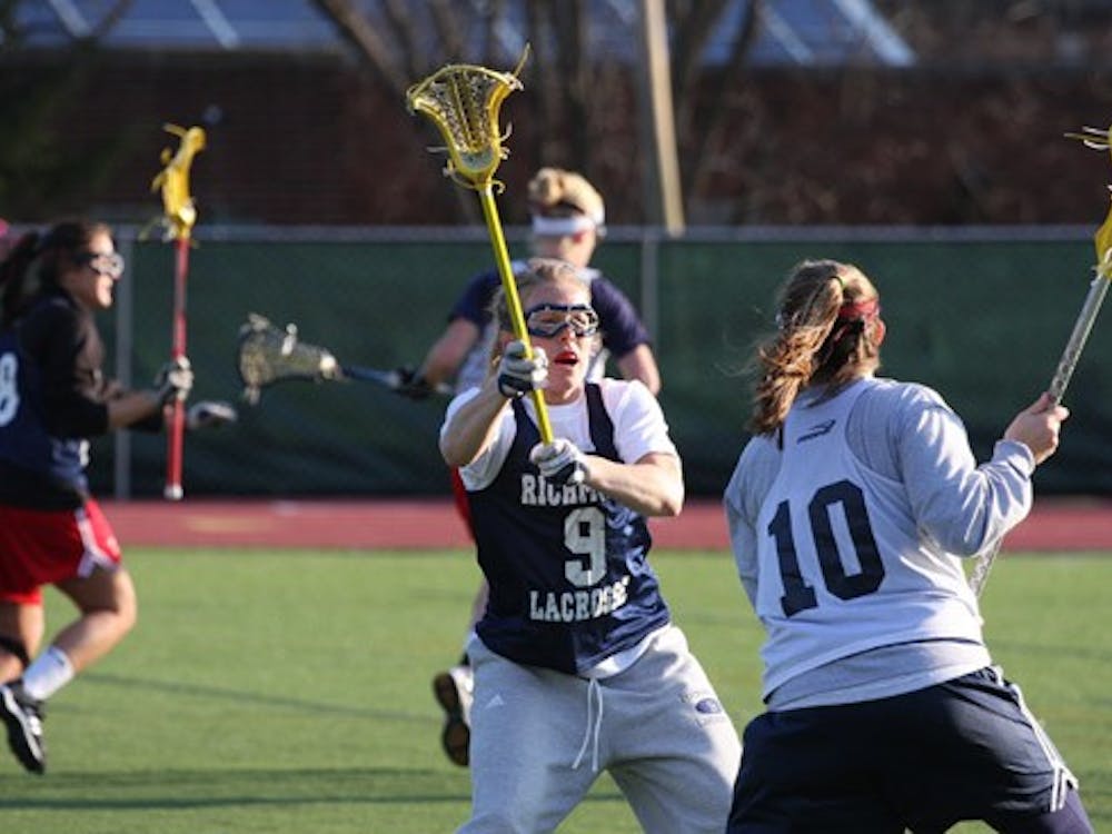 Mandy Friend, '09 and Ryan Ball, '11