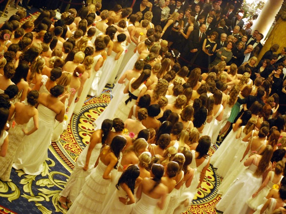 Junior women pose in the shape of the Westhampton "W."