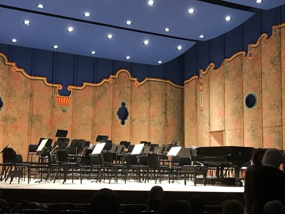 Lights glow on the stage in the Dominion Energy Center shortly before the Ukrainian National Symphony Orchestra began their performance Friday at 7 p.m.
