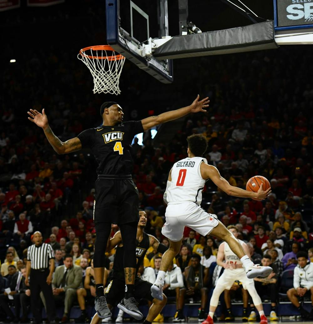 <p>Sophomore guard Jacob Gilyard during Friday's rematch against rival Virginia Commonwealth University in the Robins Center.&nbsp;</p>