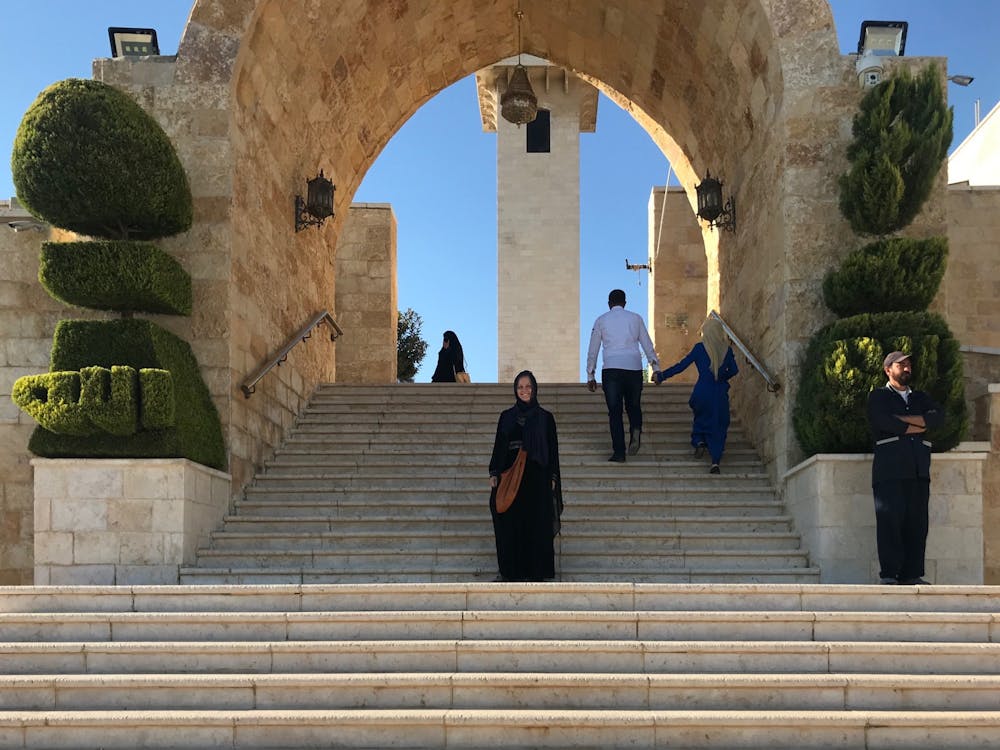 <p>Addie Jo Quinlen in front of the mosque by the Cave of the Seven Sleepers.&nbsp;</p>