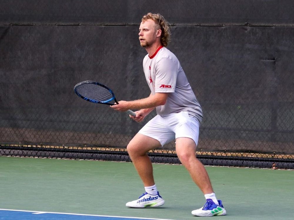 Senior Campbell Erwin remains alert at a match against Virginia Wesleyan University on March 16 at the Westhampton Courts. Photo courtesy of Richmond Athletics.