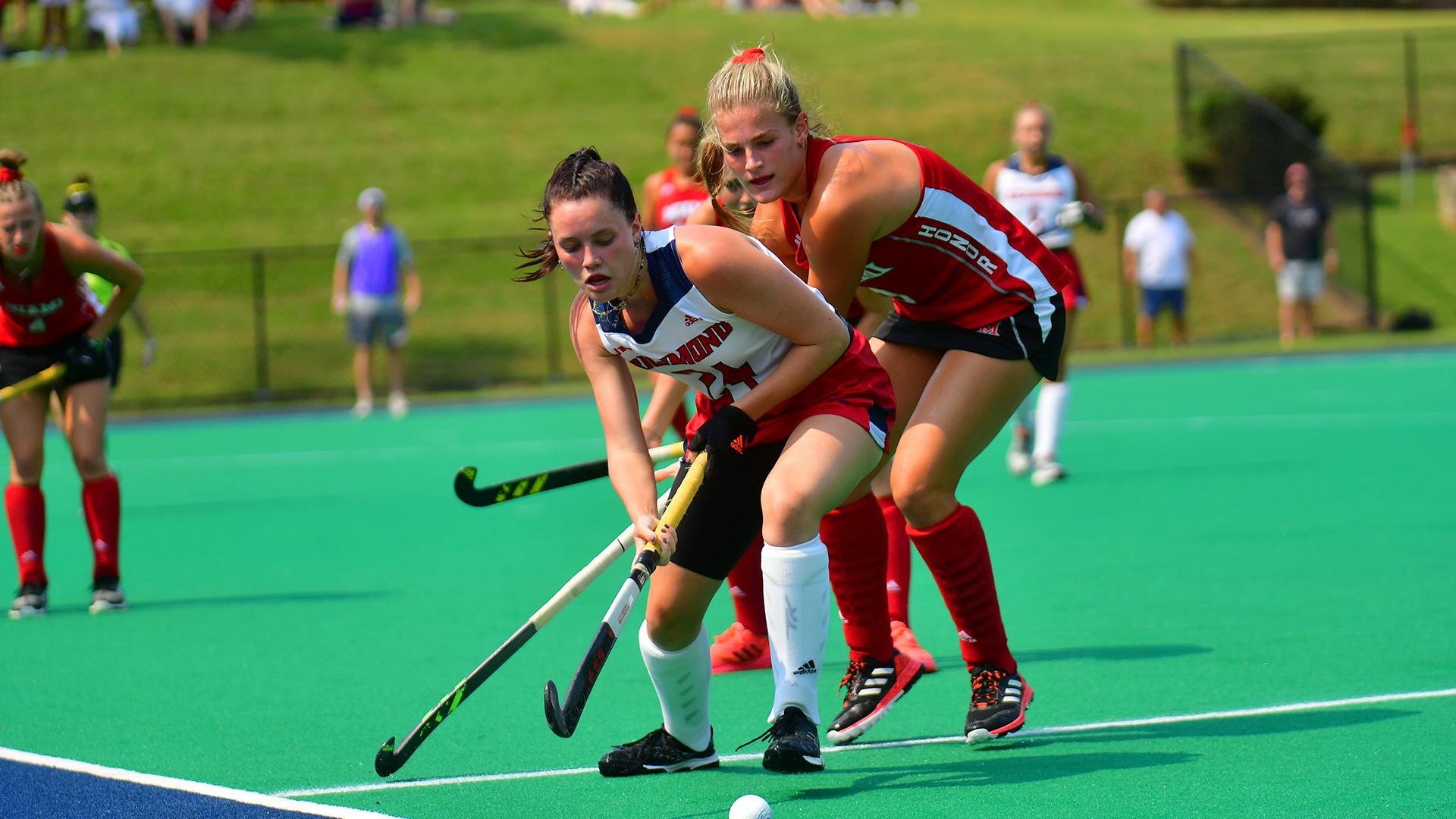 Regan McCrossan during field hockey game. Photo courtesy of Richmond Athletics.&nbsp;