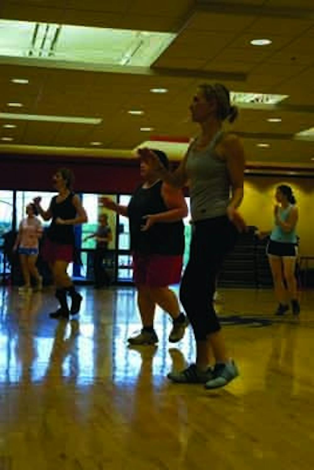 Led by Jackie Pfamatter (headset/mic), students and faculty burn carbs and dance to salsa music Zumba on Tuesday Sept 23rd at 12:00pm in the Fitness Center.