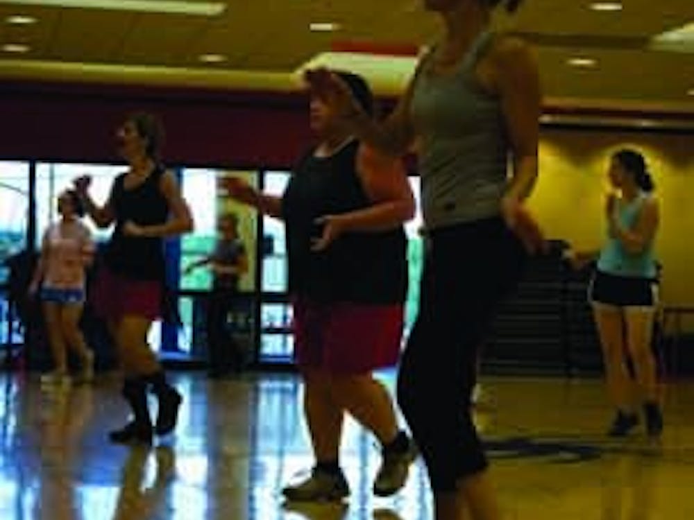 Led by Jackie Pfamatter (headset/mic), students and faculty burn carbs and dance to salsa music Zumba on Tuesday Sept 23rd at 12:00pm in the Fitness Center.