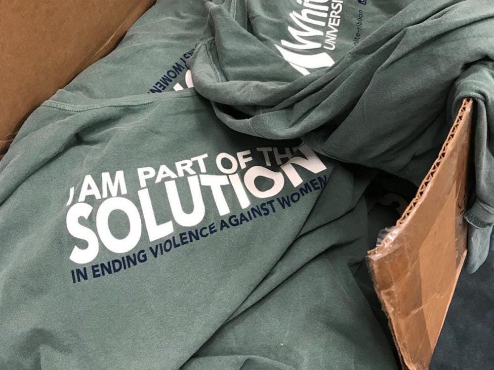 Part of the campaign's strategy is to distribute the t-shirts pictured above in order to promote dialogue, Richmond College Dean Joe Boehman said. Photo courtesy of the White Ribbon Campaign at UR's Instagram page.