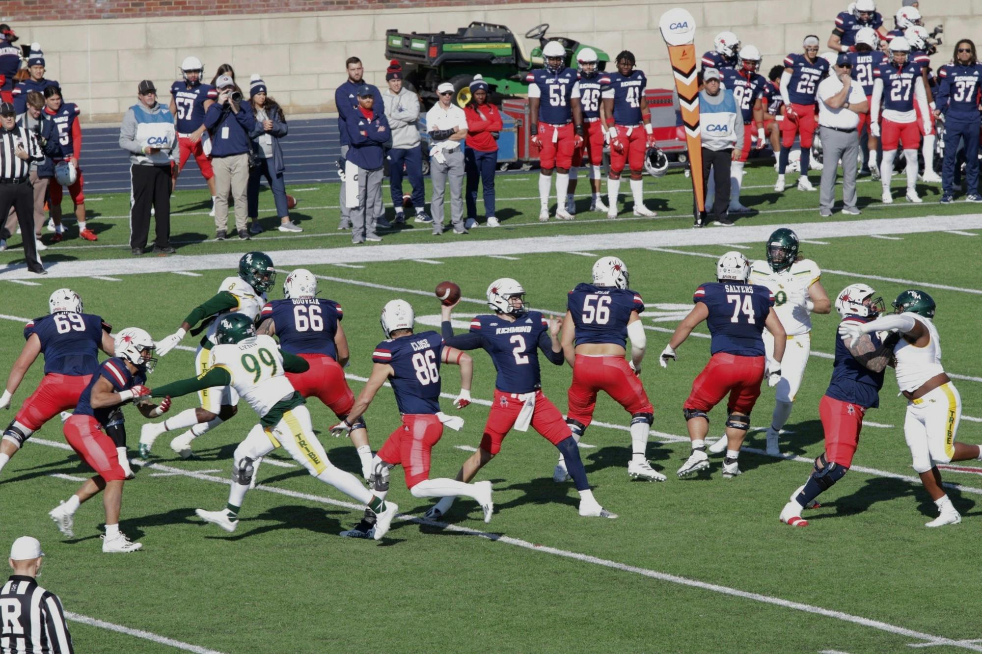 Quarterback Reece Udinski throws the ball at the team’s final regular game of the season against William &amp; Mary on Nov. 19.