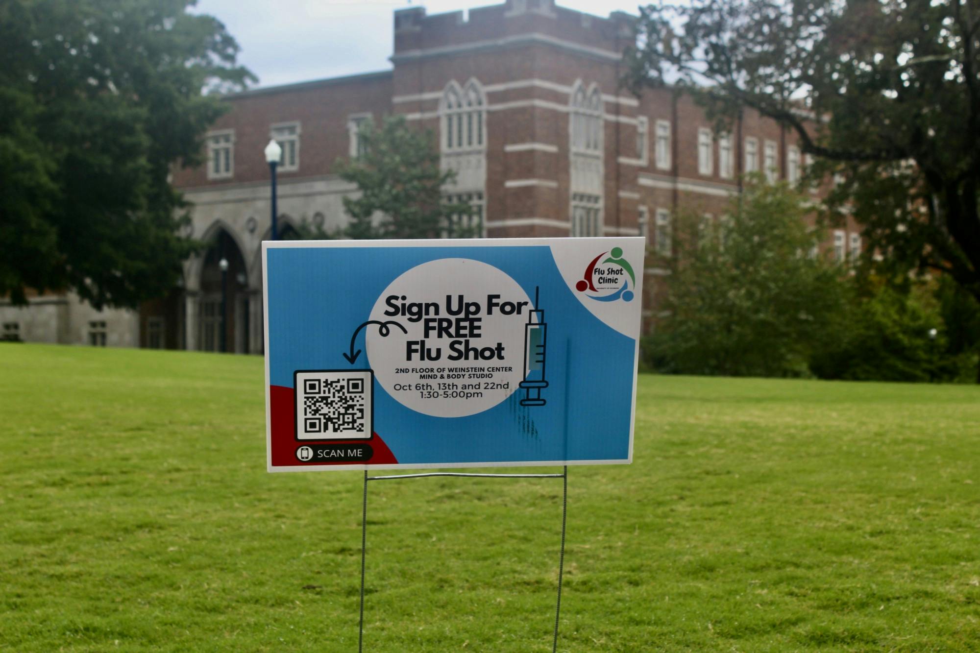 Flu shot sign located by the Well-being Center on campus.&nbsp;