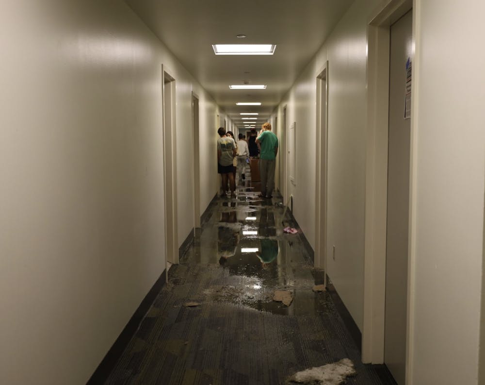 Students on the first floor of Gray Court emptied out their dorms after the hall was severely damaged by water on Friday night. 