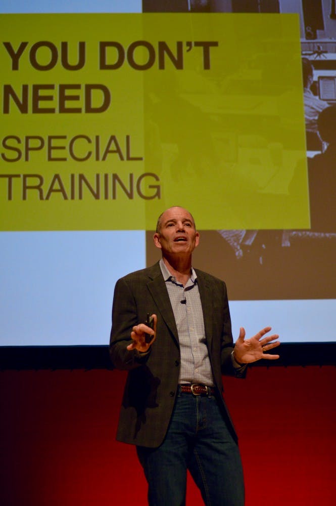 Marc Randolph speaking in Booker Hall at the University of Richmond.