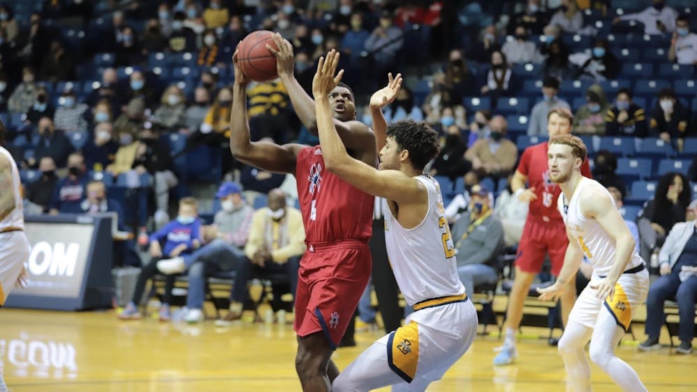 <p>Nathan Cayo '22 play for the Spiders at an earlier basketball game at Robins Stadium. Photo courtesy of Richmond Athletics.&nbsp;</p>
