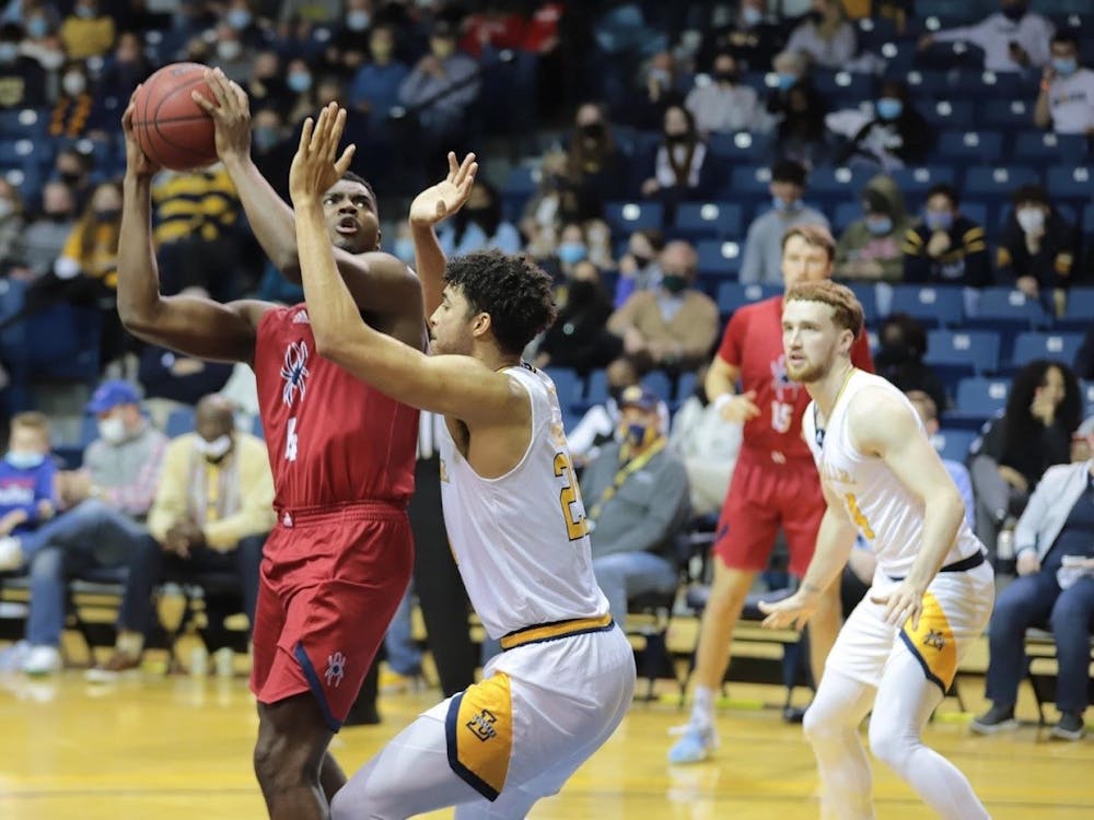 Nathan Cayo '22 play for the Spiders at an earlier basketball game at Robins Stadium. Photo courtesy of Richmond Athletics. 