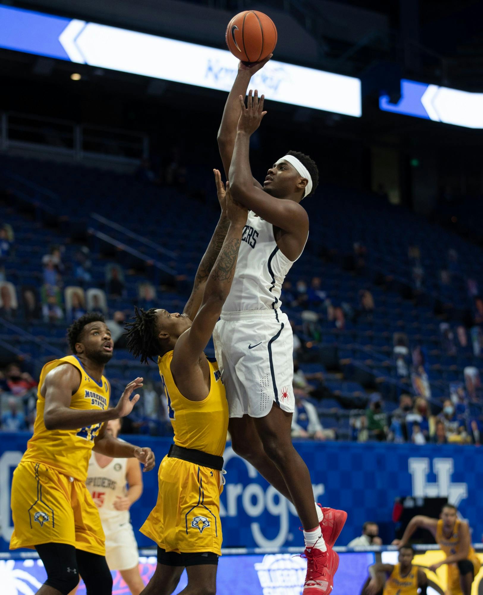 Senior forward Nathan Cayo takes a contested shot during a game against Morehead State on Friday November 27, 2020 at Rupp Arena in Lexington, Kentucky.  Photo by Mark Cornelison via SEC Media Portal.