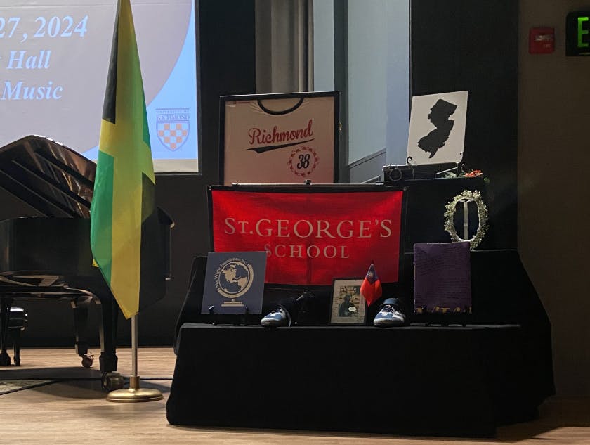 Friends and family left items representing Elvin's life and interests on an altar at the front of the hall.