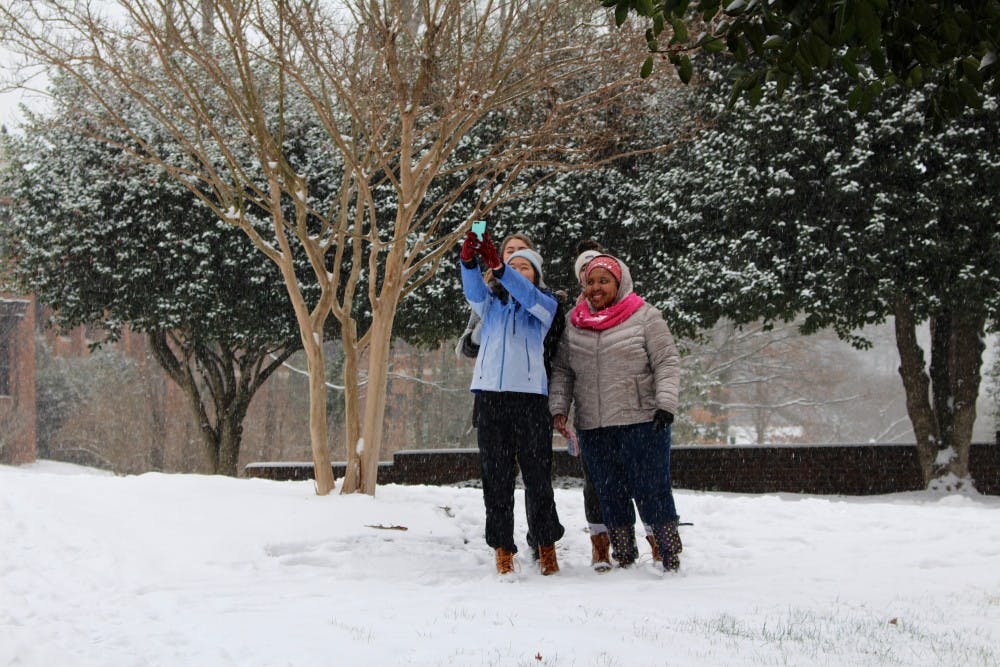 Westhampton College students enjoy the snow. Photo by&nbsp;Rayna Mohrmann