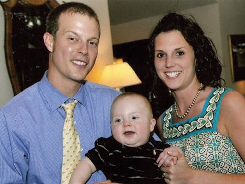 Carolyn Powell with husband Luke Powell and son.