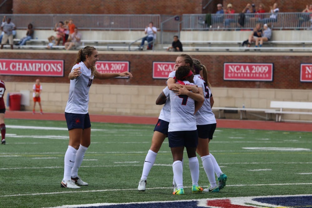 <p>Keaira Clark celebrates with her teammates after scoring the lone goal in Sunday's game against UMass.&nbsp;</p>