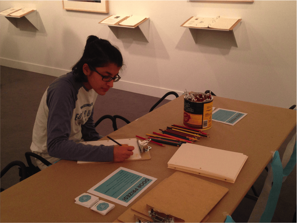 Senior Surabhi Gupta draws a picture in response to the art.