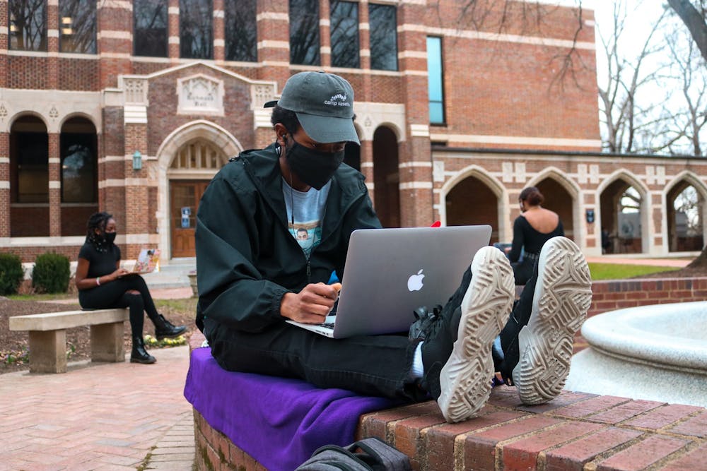 <p>Junior Cameron Keeley-Parker gathers in the Stern quadrangle for the teach-in protest.</p>