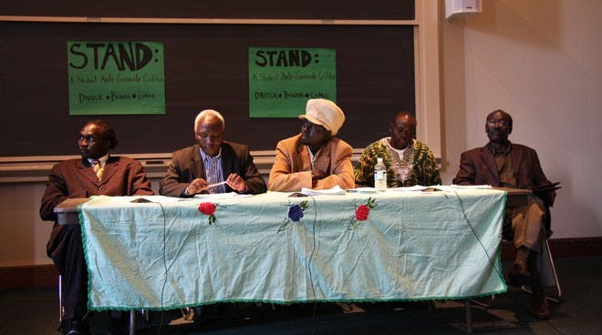 William Deng, Dr. Mohammad Ahmed, Addalla Musa Nour, Anthony Makuach, and Chol Leeth sit together, awaiting their second question