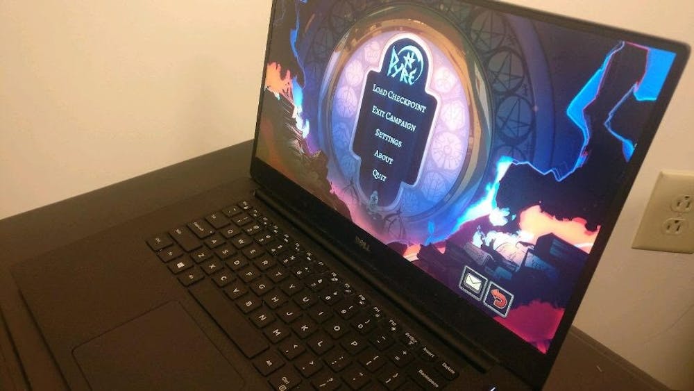 <p>"Pyre," pictured on the computer, is a game developed by SuperGiant, a video game developer known for their art and storytelling components.&nbsp;</p>