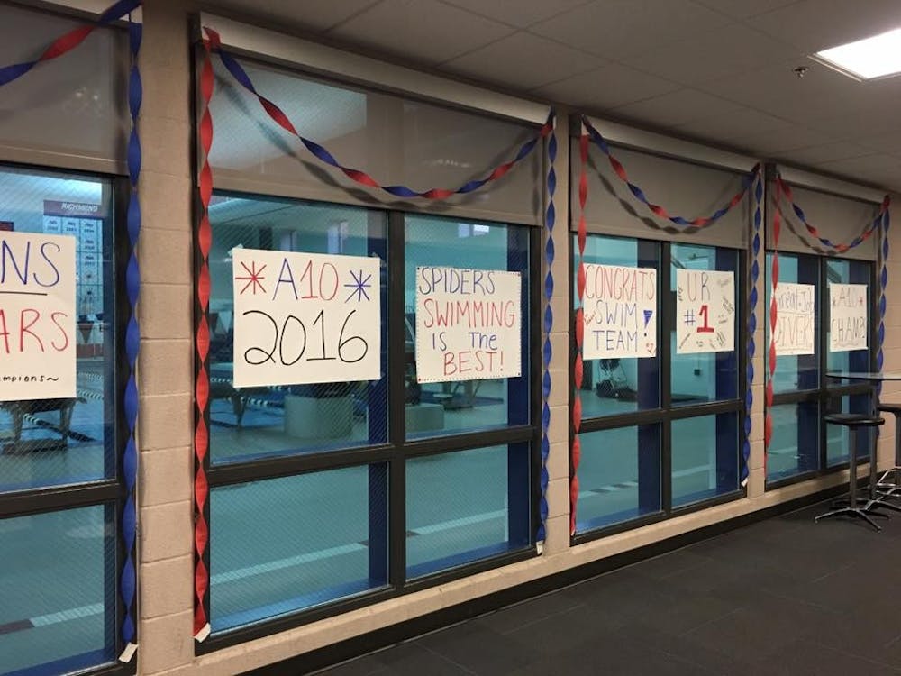 <p>Banners hang outside the Weinstein Center natatorium to celebrate Richmond's swim and dive team for its conference title.&nbsp;</p>