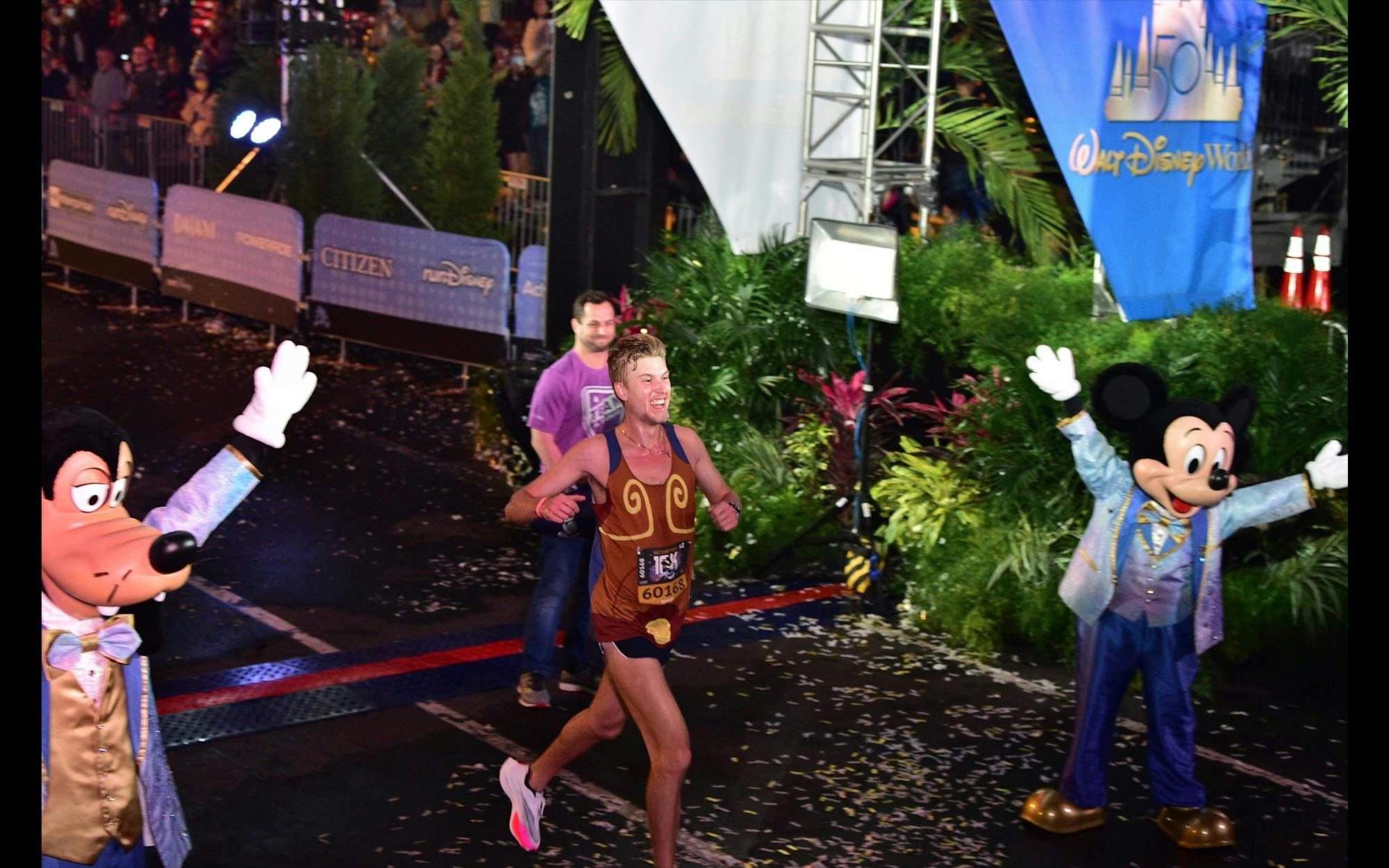 Cross country runner junior Robert Gunia crosses the finish line at the annual Walt Disney World 10k race on Jan. 7 in Orlando, Florida. Picture courtesy of Gunia.