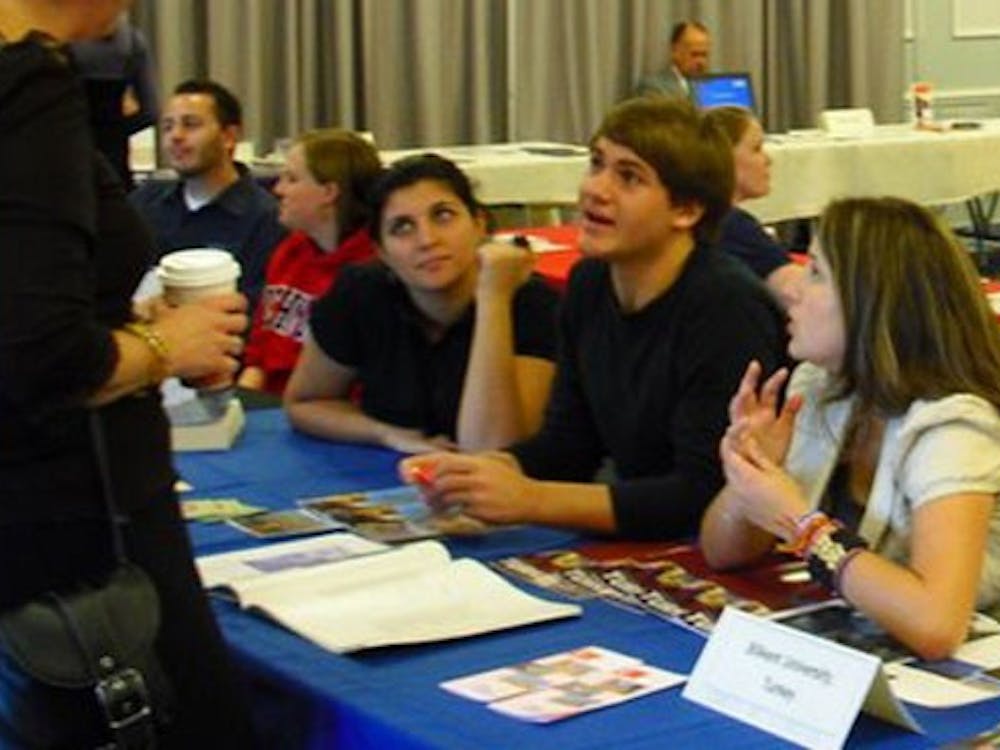 Turkey Table with Michelle Cox, Sarah Gilbert, David Mowry. Check story for years and positions.