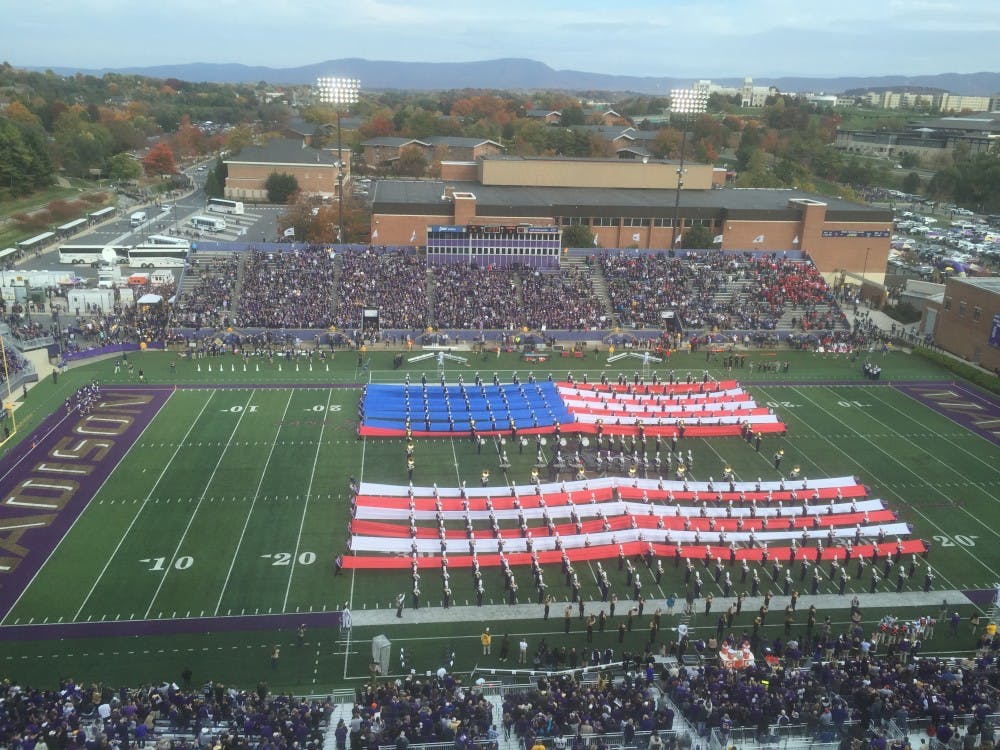 JMU's marching band performs the National Anthem in anticipation of today's game at 3:30 p.m. 