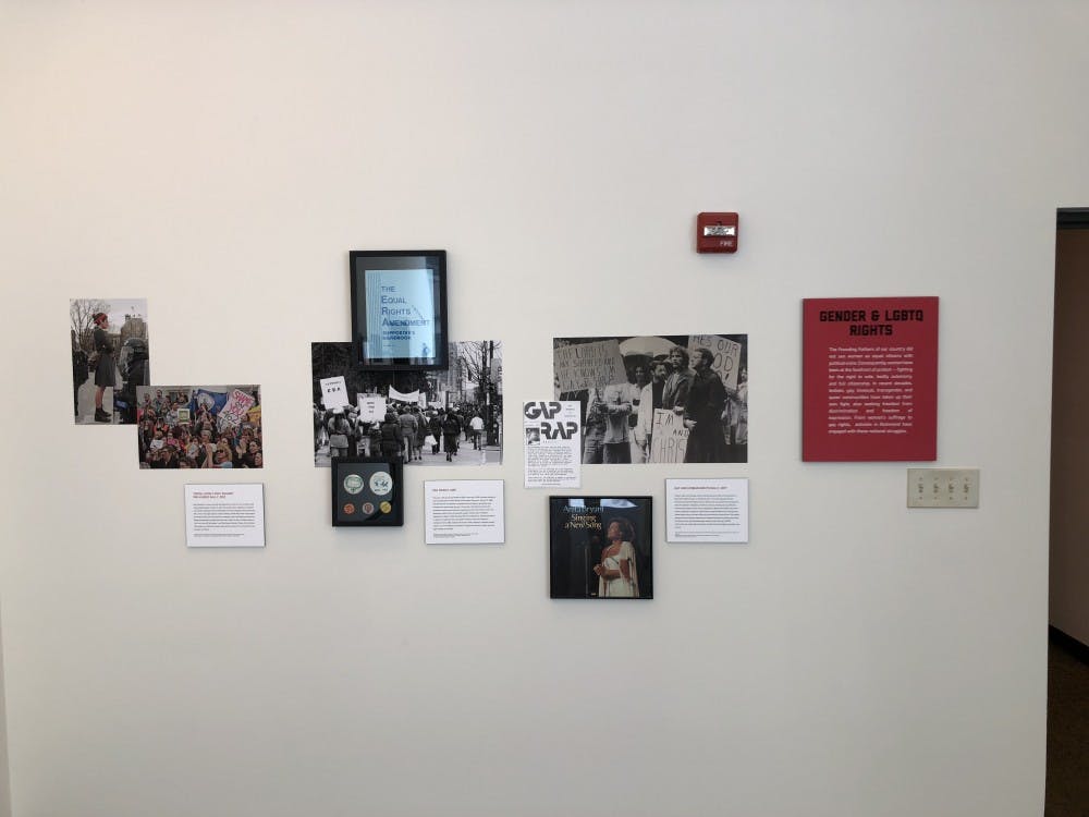 Pictures and artifacts from protests on gender and LGBT rights at the exhibit.&nbsp;