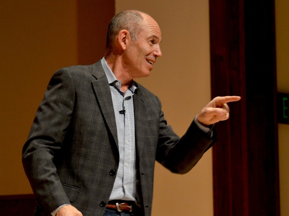 Marc Randolph answers a question from a member in the audience.