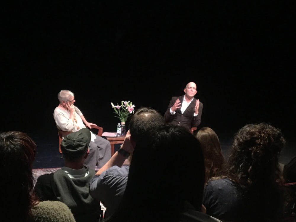 Talyor Mac (right) speaks to Dorothy Holland as part of an artist's talk for&nbsp;the University of Richmond’s Tucker-Boatwright Festival of Literature and the Arts on Thursday night.