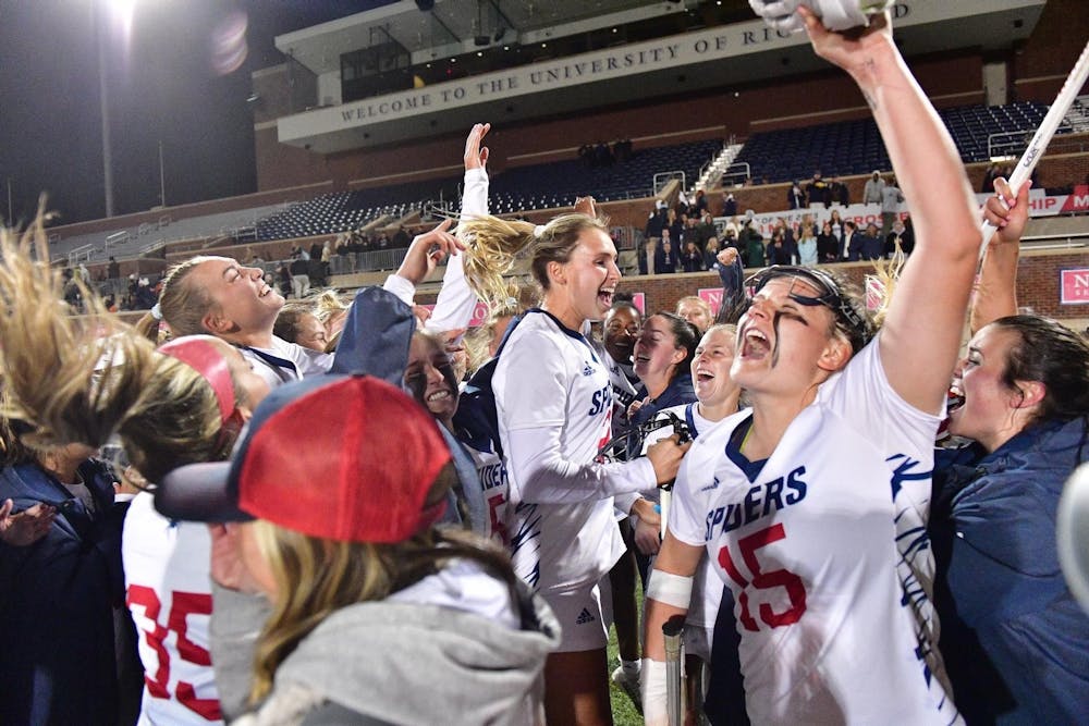 <p>Women’s lacrosse team celebrates win over No. 10 University of Virginia at the E. Claiborne Robins Stadium on March 15.&nbsp;</p>
