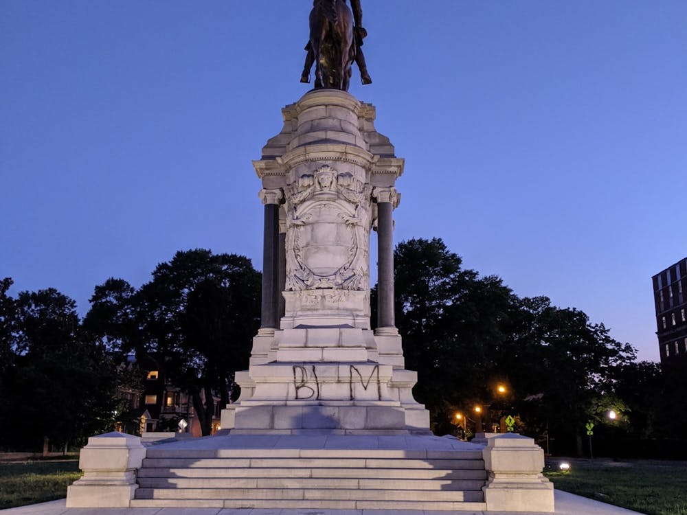 "BLM," the acronym for Black Lives Matter, written on the J.E.B. Stuart statue on Monument Avenue on May 30.&nbsp;