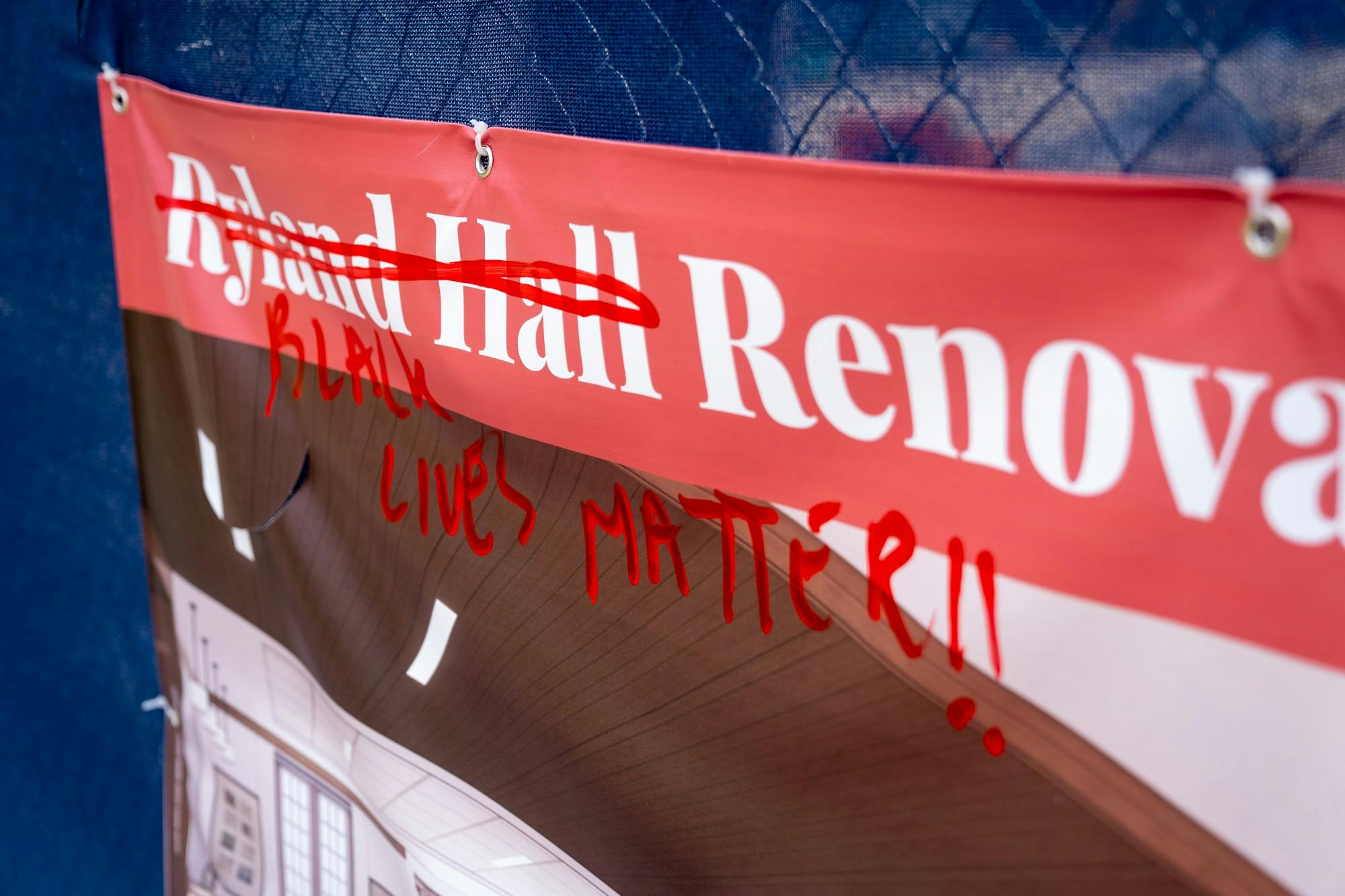 Red paint was used to write "Black Lives Matter" on a sign next to the construction site of Ryland Hall between the night of March 22 and morning of March 23.