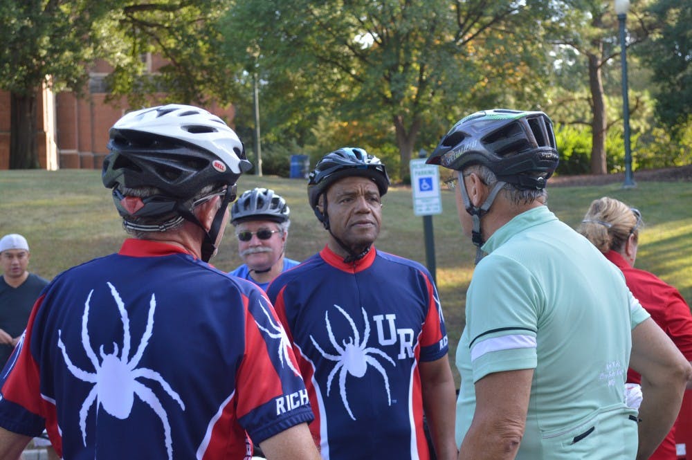 <p>Crutcher spent some time before the ride chatting with some of the riders</p>