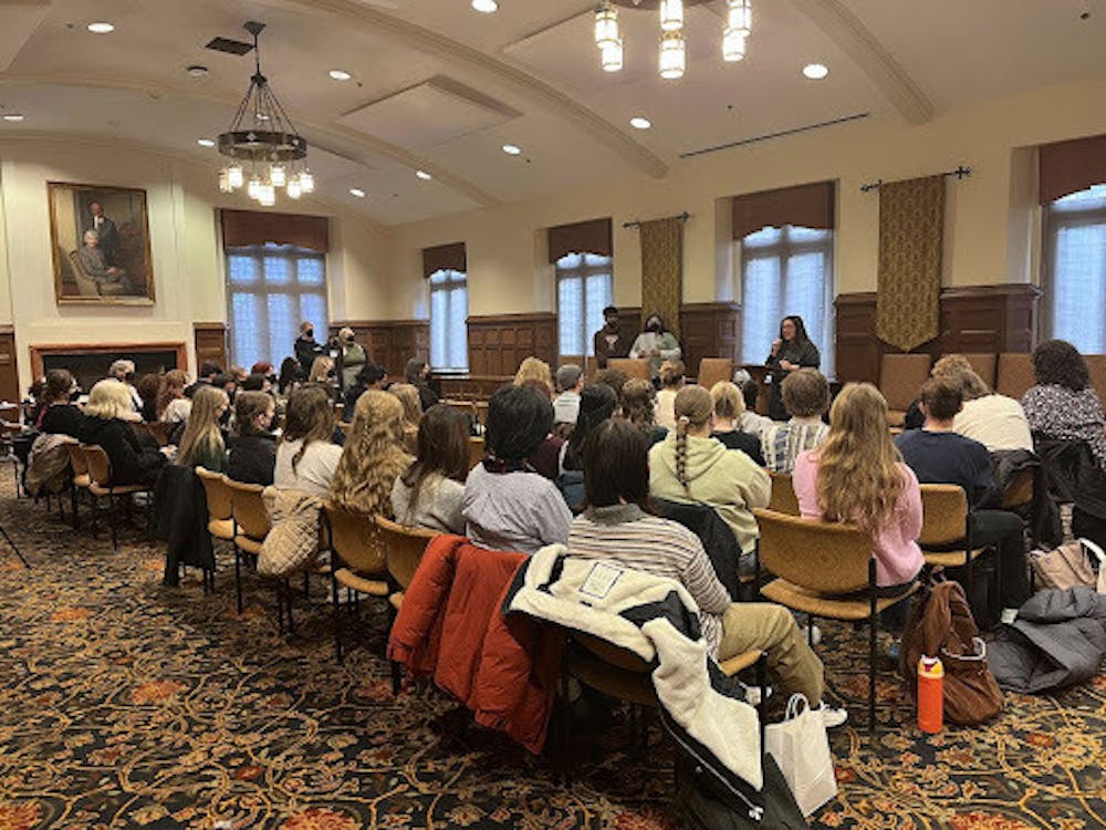 <p>Attendees listen to speaker Mimi Khúc at the will<em> + </em>WGSS Speaker Series</p>