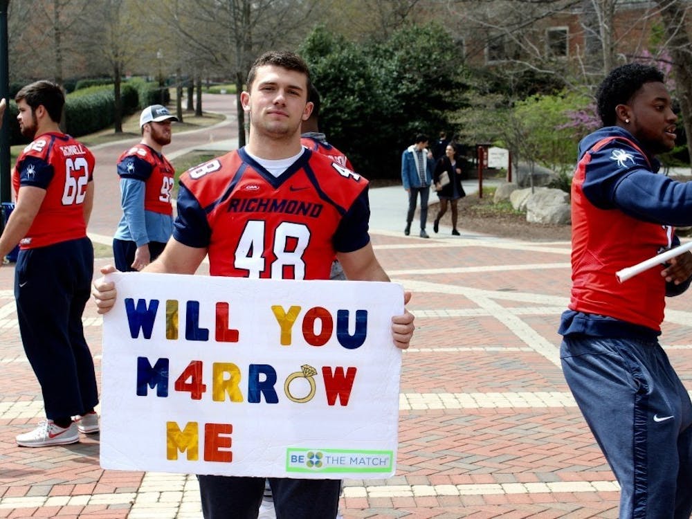 Gus Lee and his football teammates helped register more than 200 people on campus for the bone marrow registry.&nbsp;